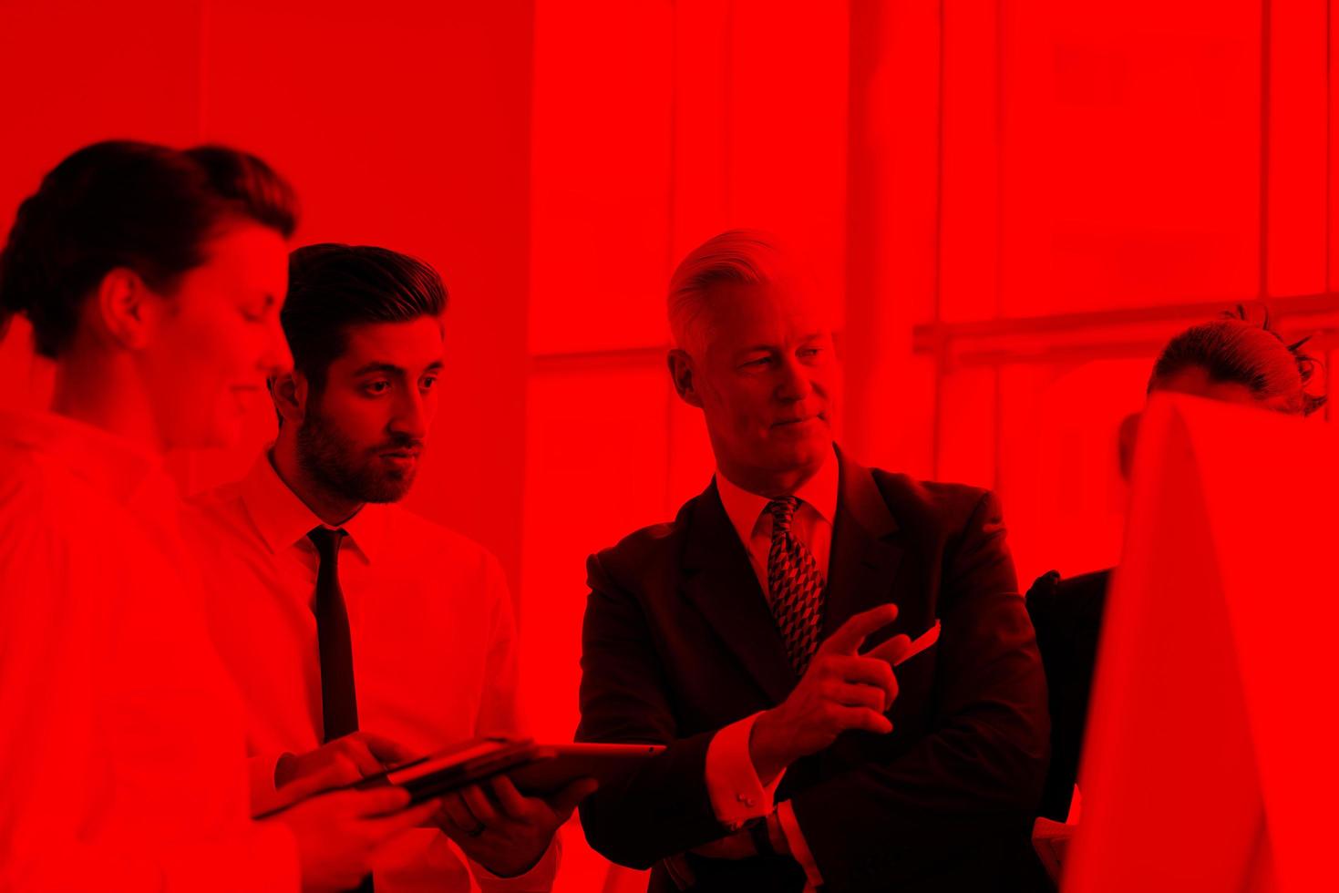 young startup businessman making presentation to senior investior photo