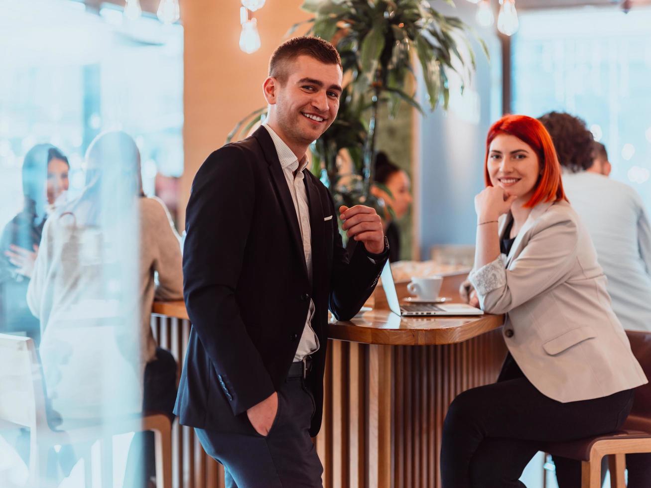 modern man and woman use modern devices, laptop, tablet and smartphone and arrange new projects for the job. Business concept . photo