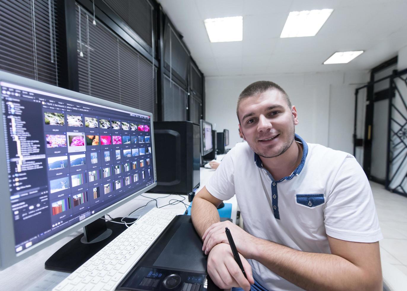 photo editor at his desk