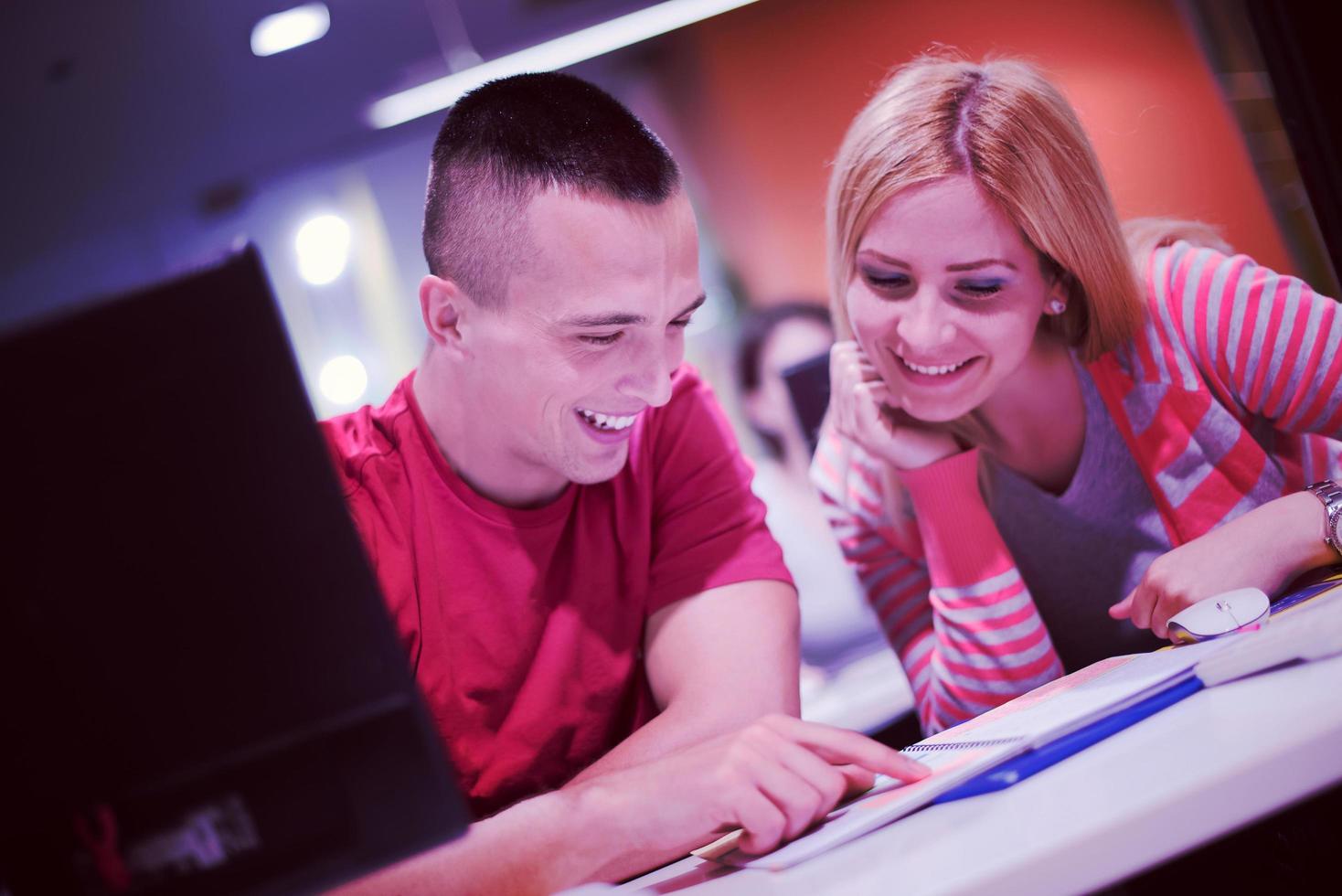 technology students group working  in computer lab school  classroom photo