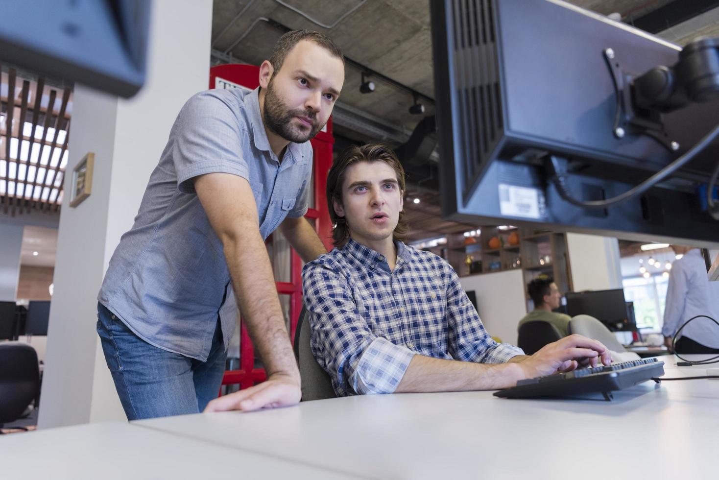 startup business people group working as team to find solution photo