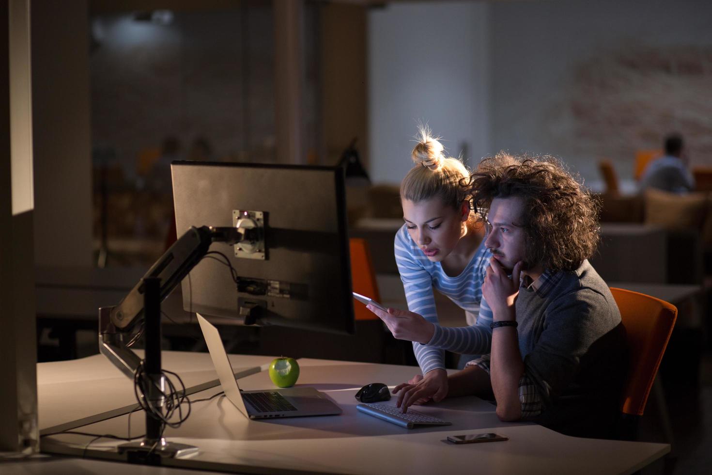 young designers in the night office photo