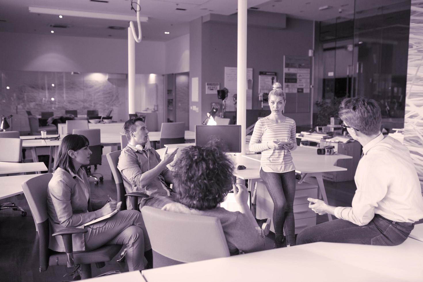 Young Business Team At A Meeting at modern office building photo