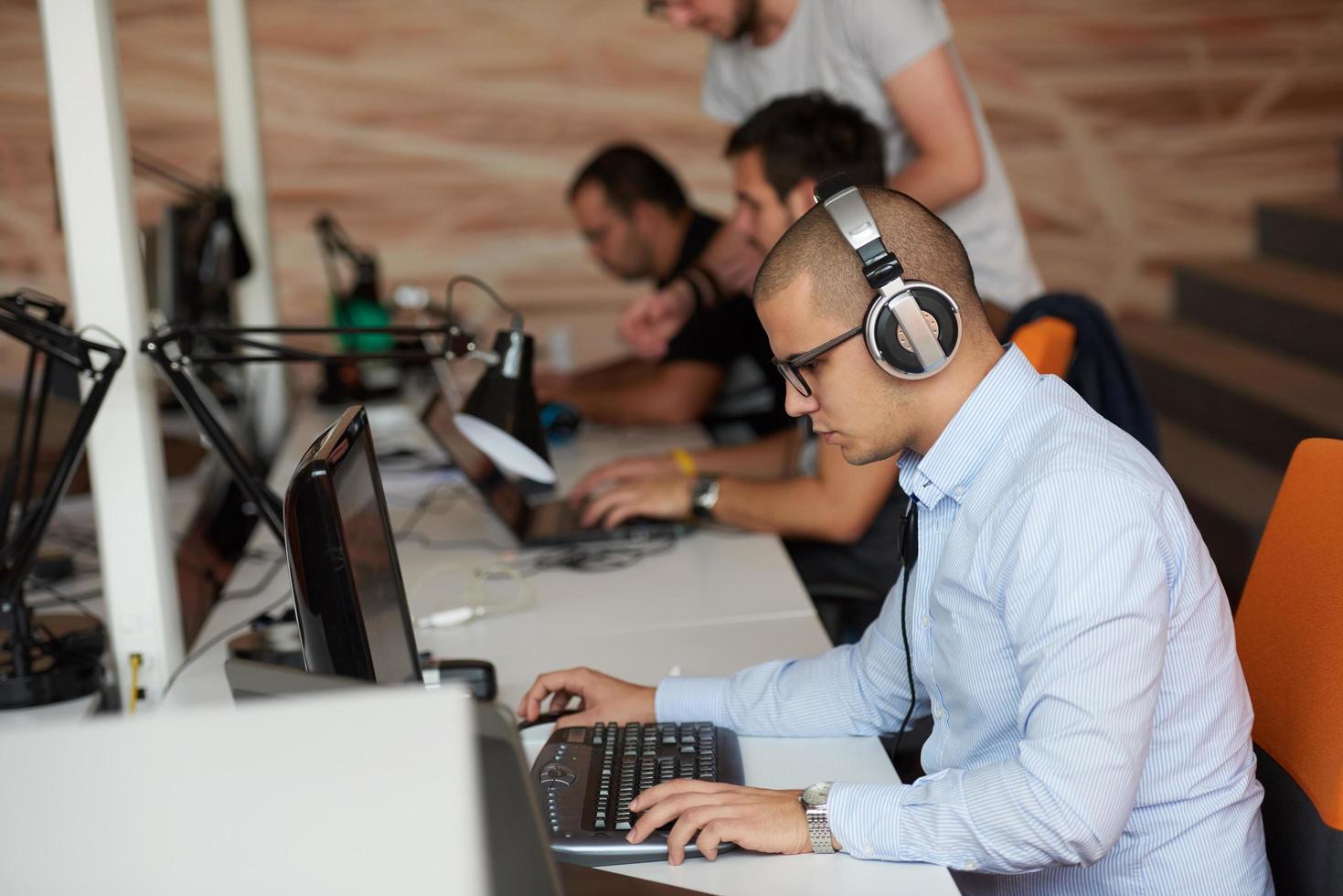 startup business, software developer working on computer photo