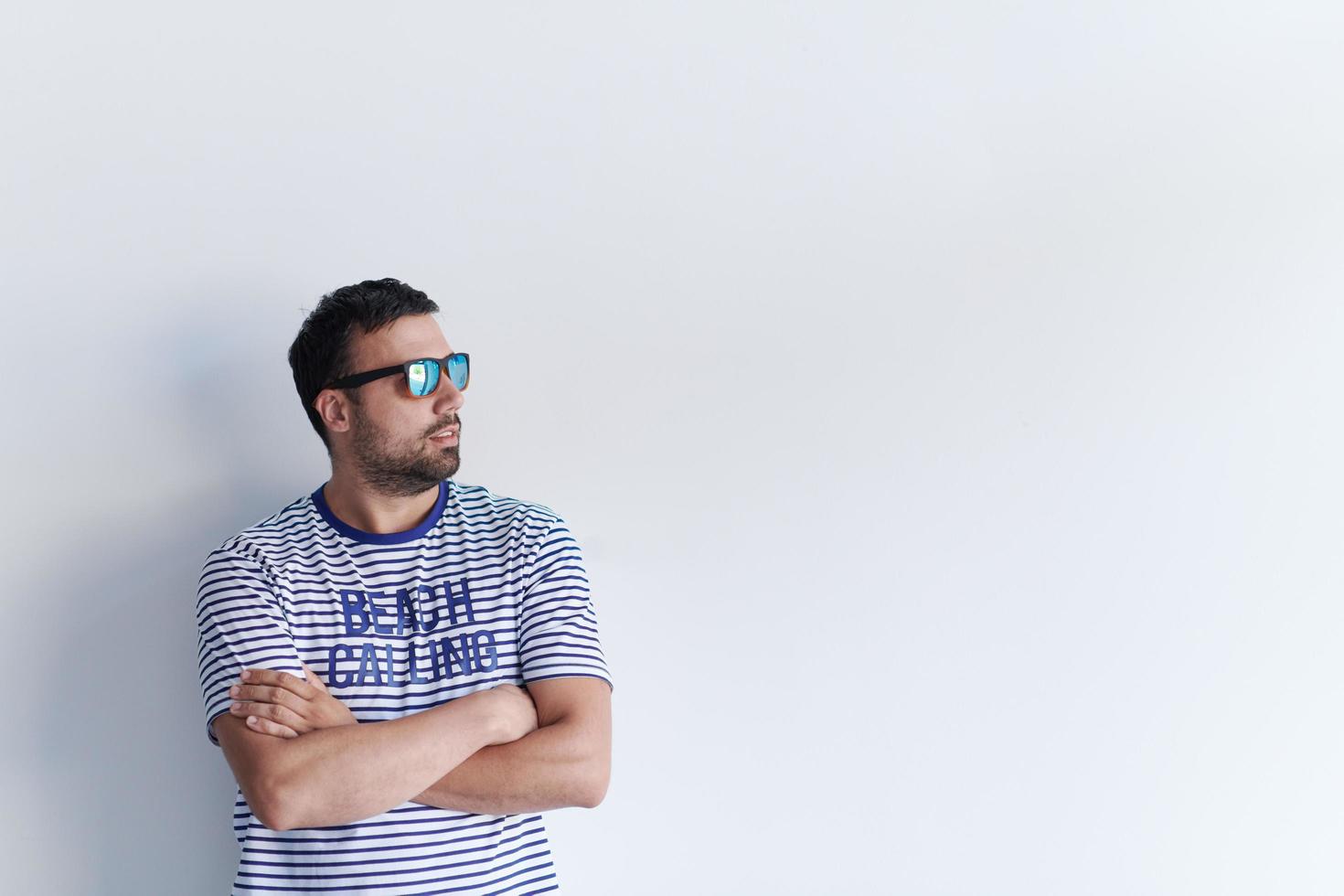 portrait of casual startup businessman wearing sunglasses photo