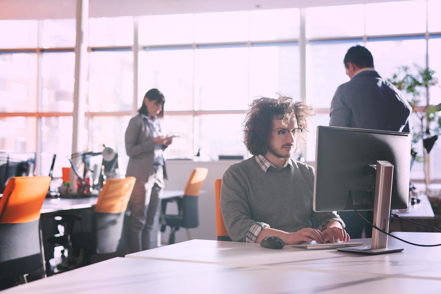 businessman working using a computer in startup office photo