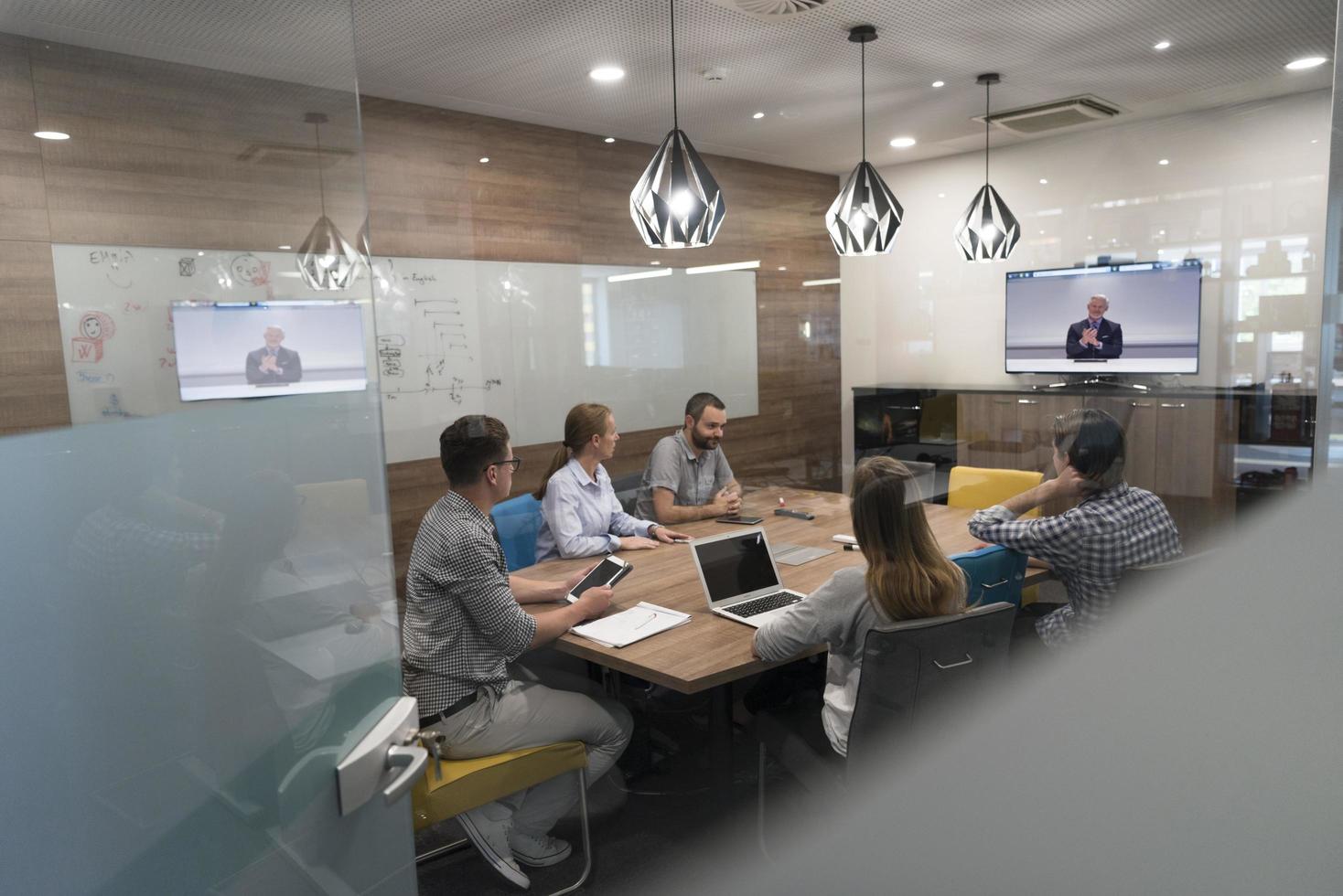 start up business people group attending videoconference call photo