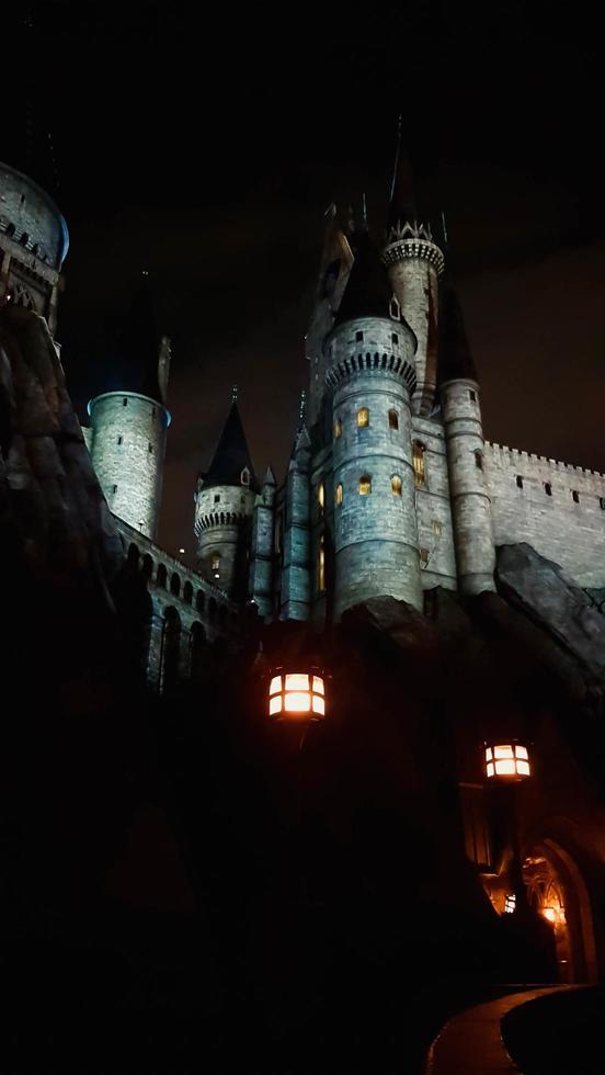 Osaka, Japan on July 8, 2019. A very beautiful light show at night at Hogwarts Castle that you must and must see when you visit Universal Studios Japan. photo