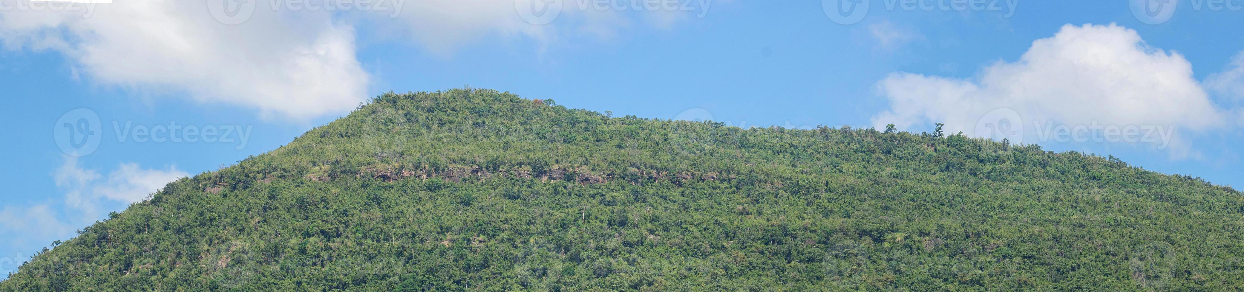 Great mountain views on the bright sky background photo