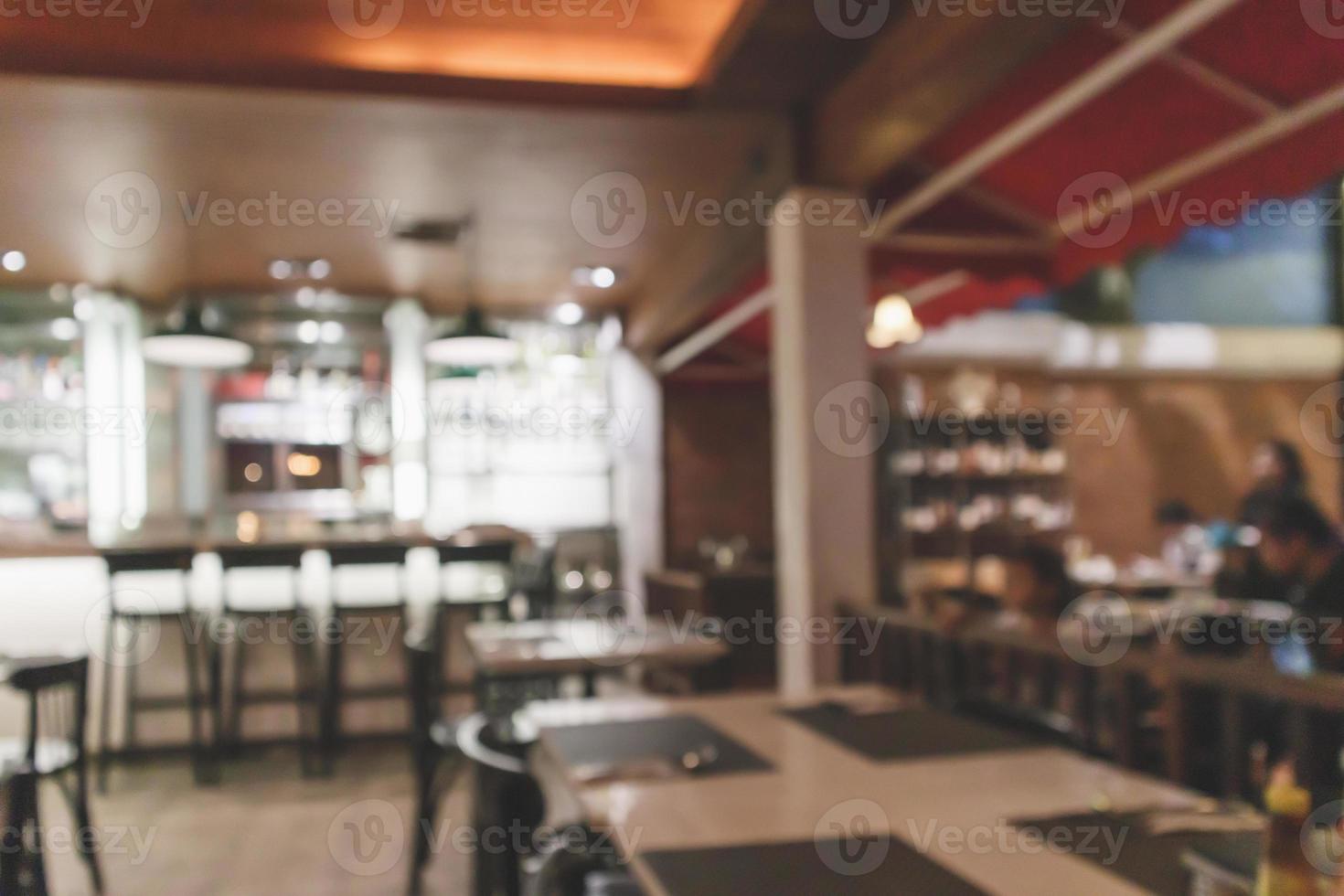 Cafe Restaurant interior with bar counter blur abstract background with bokeh light photo