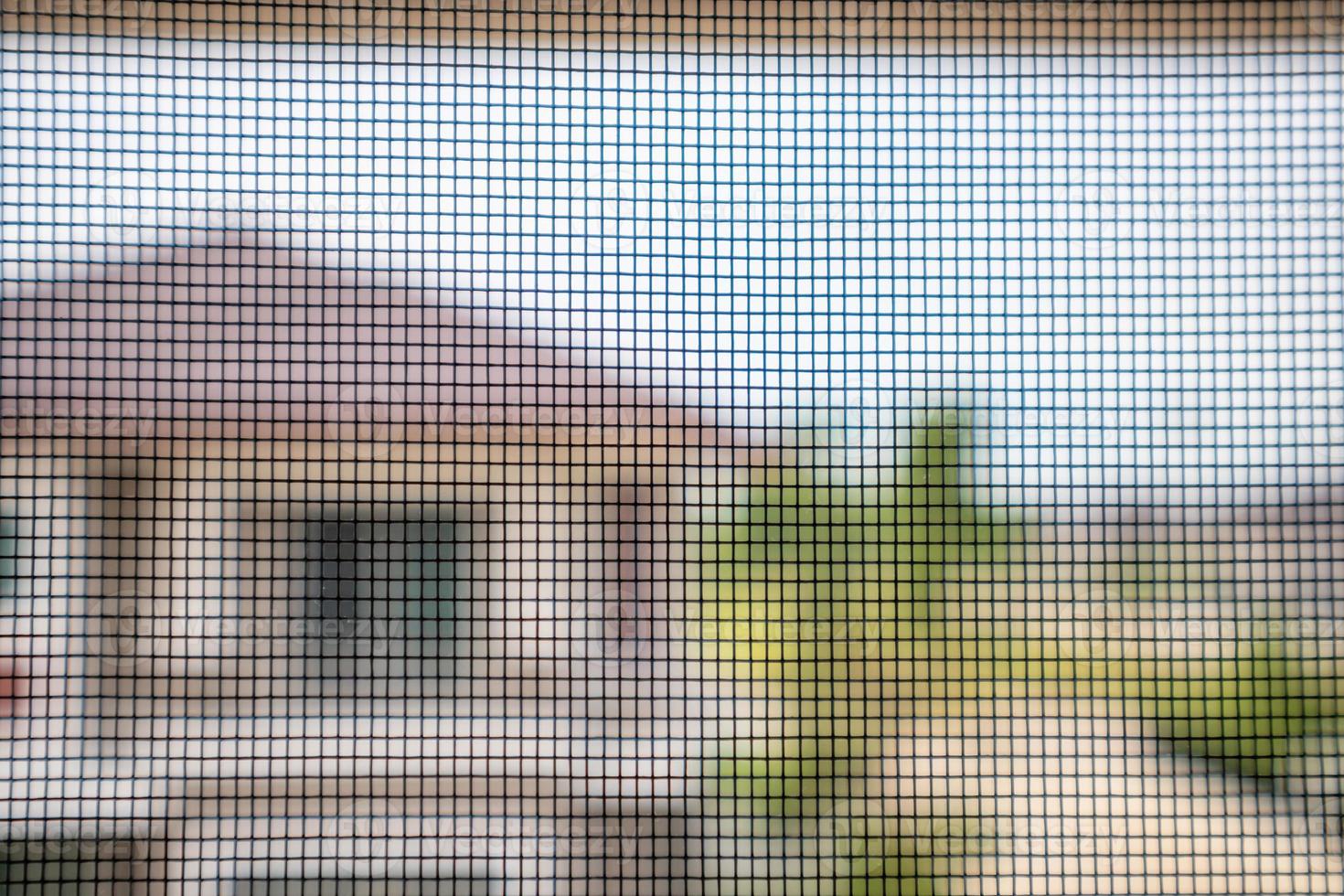 mosquito net wire screen on house window protection against insect photo