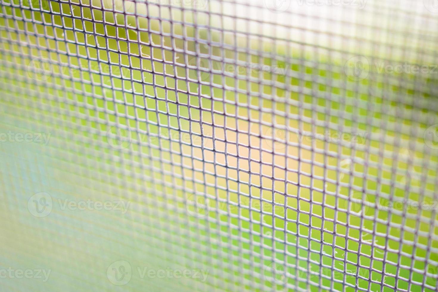 mosquito net wire screen close up on house window protection against insect photo