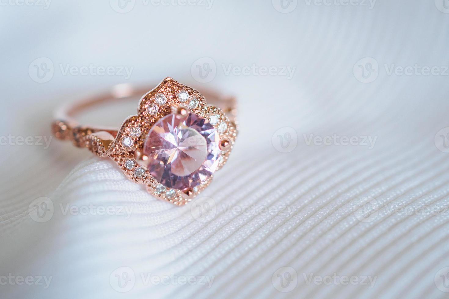Jewelry luxury pink gold sapphire gemstone ring background photo