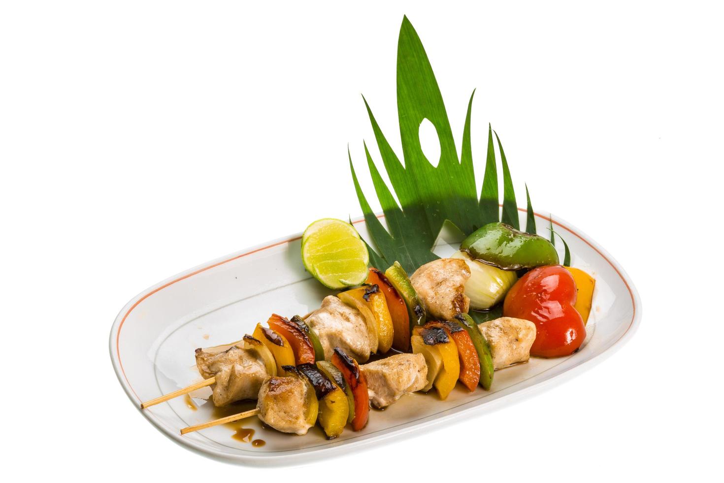 Pork barbecue on the plate and white background photo