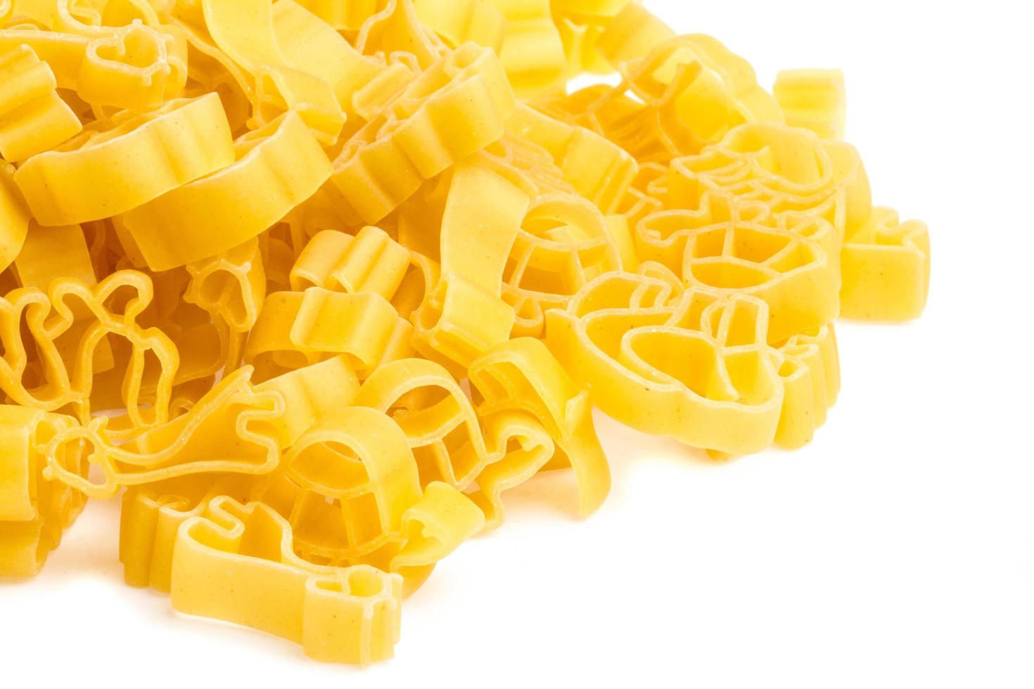 Raw yellow Italian pasta photo