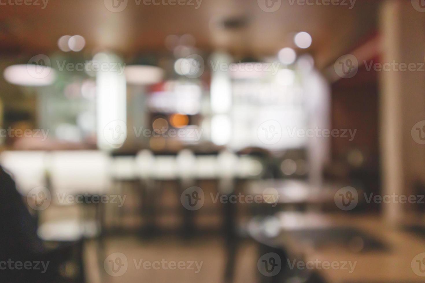 Cafe Restaurant interior with bar counter blur abstract background with bokeh light photo