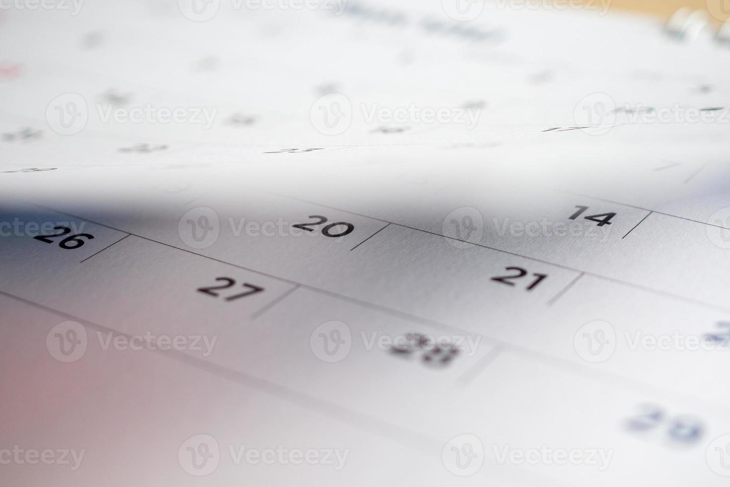 calendar page flipping sheet close up background photo