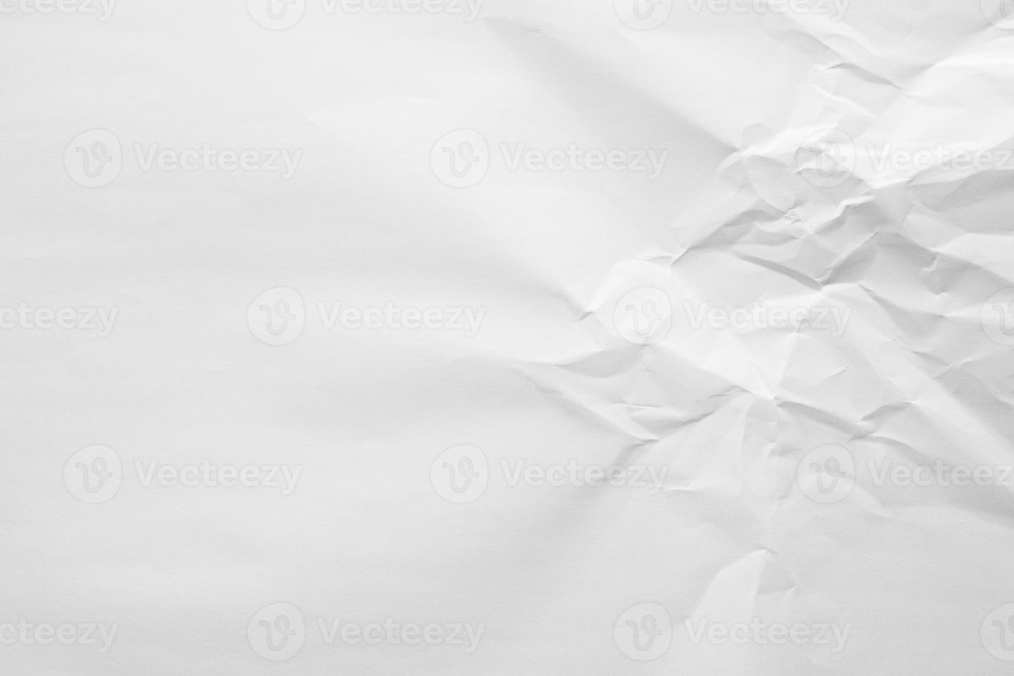 Abstract white crumpled paper texture background photo