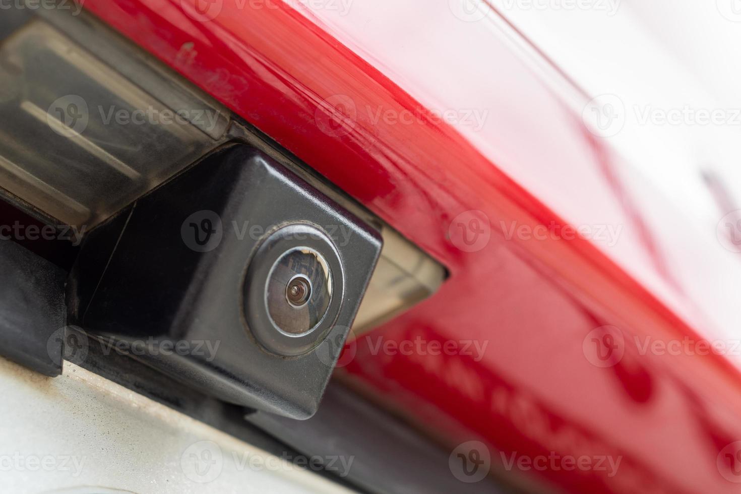 Red car rear view camera close up for parking assistance photo
