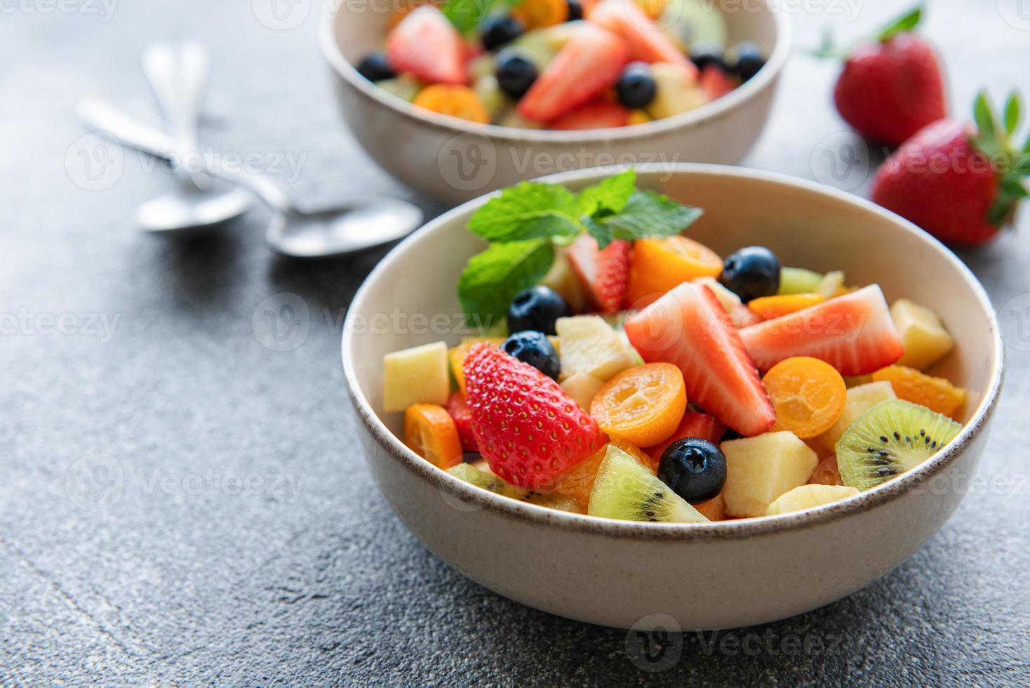 Healthy fresh fruit salad in a bowl photo