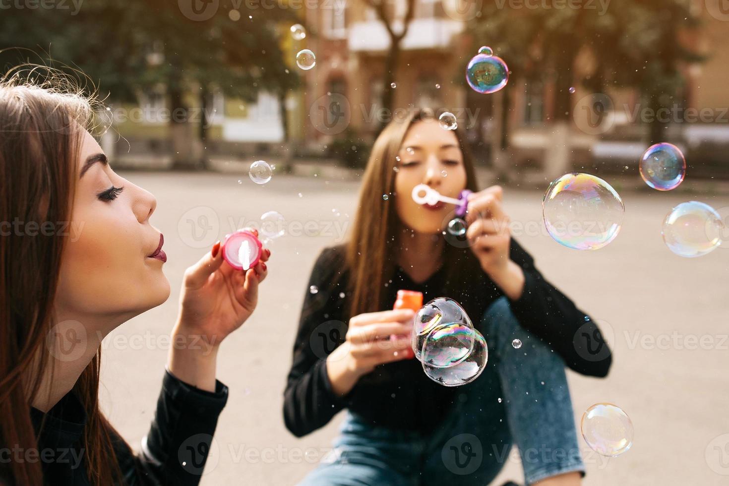 Two young adult girls photo