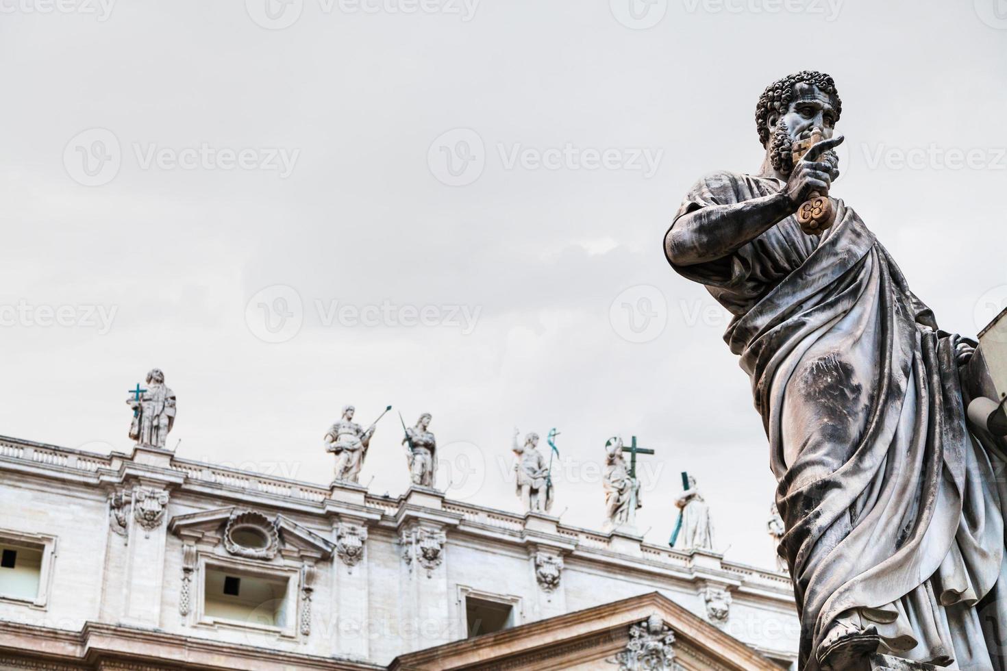 Statue Saint Peter close up on piazza San Pietro photo