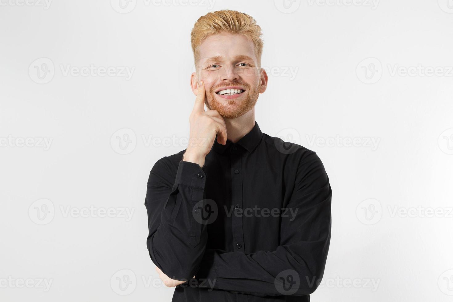 Happy Stylish guy in black shirt. Folded arms, copy space. Successful young, Entrepreneur concept. Redheaded man with red beard. Start up, young founder concept isolate on white background photo