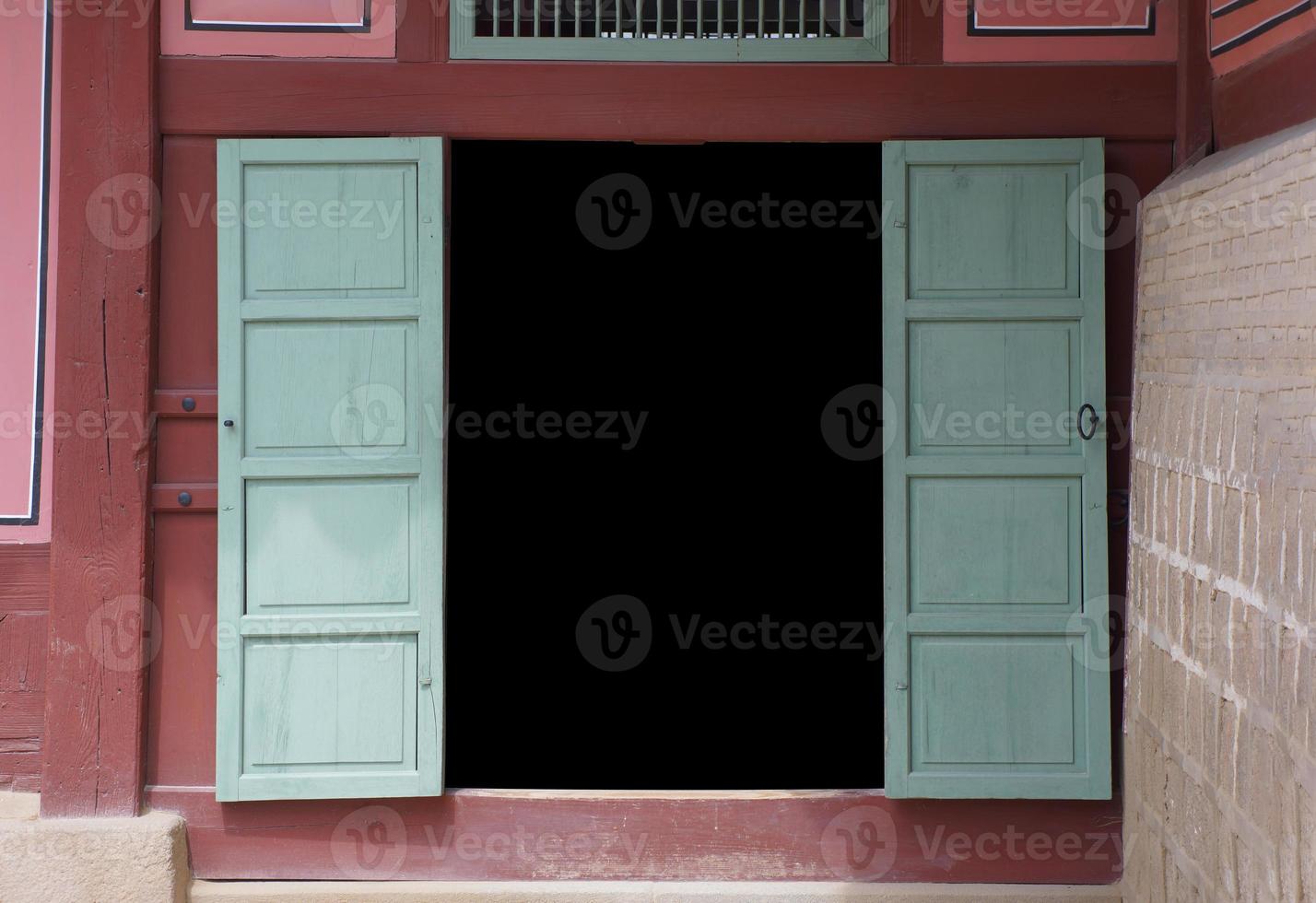 Korea Classic and Vintage old terrace with window and door in the palace. It's created by wood and painted to red, green traditional Korean arts style. photo