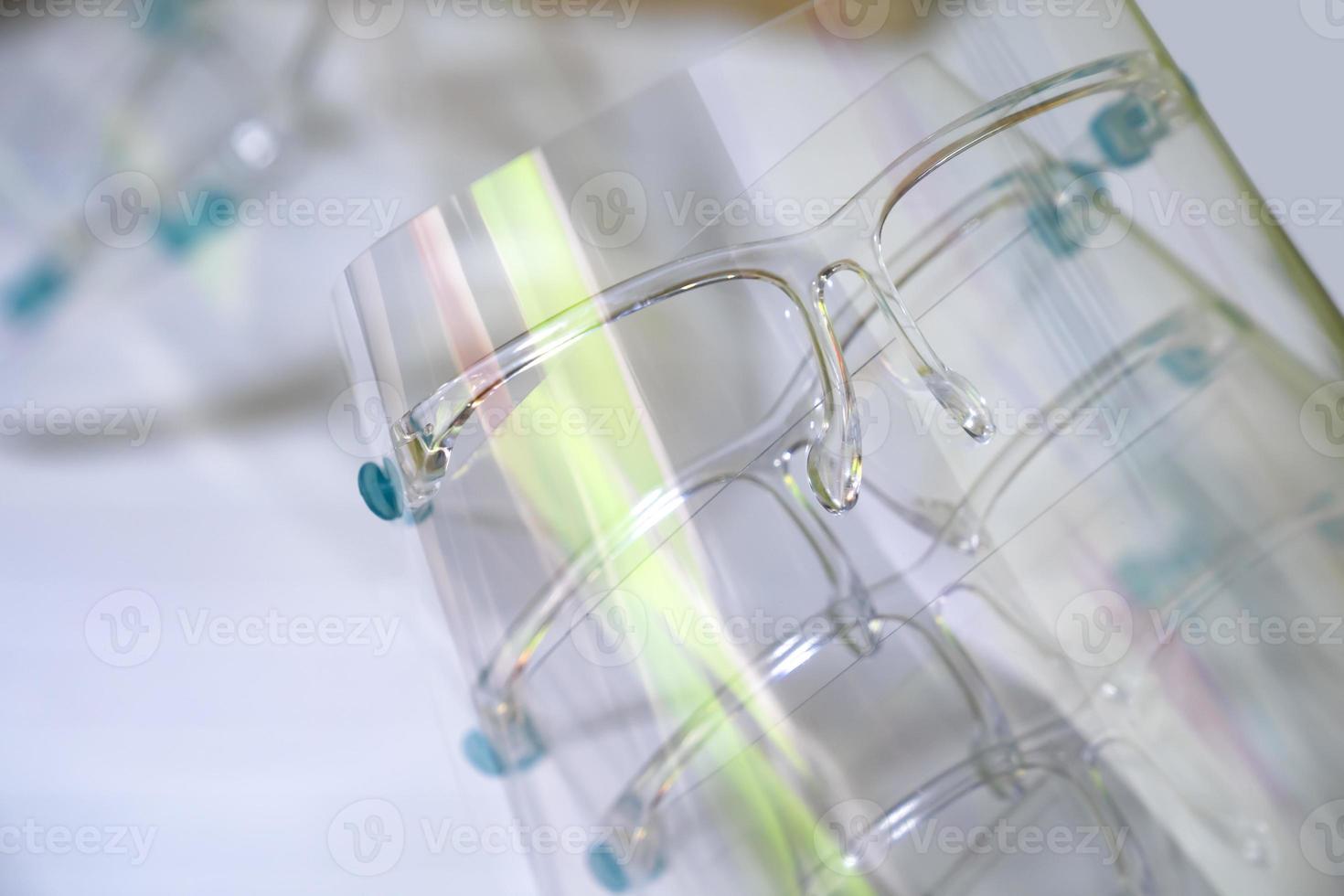 Face Shields are prepared on the white table. It's ready to use. photo