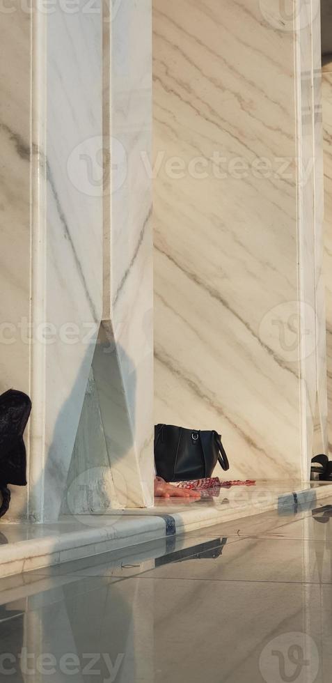 Jakarta, Indonesia in April 2022. A black bag is placed on the foyer of the mosque. photo