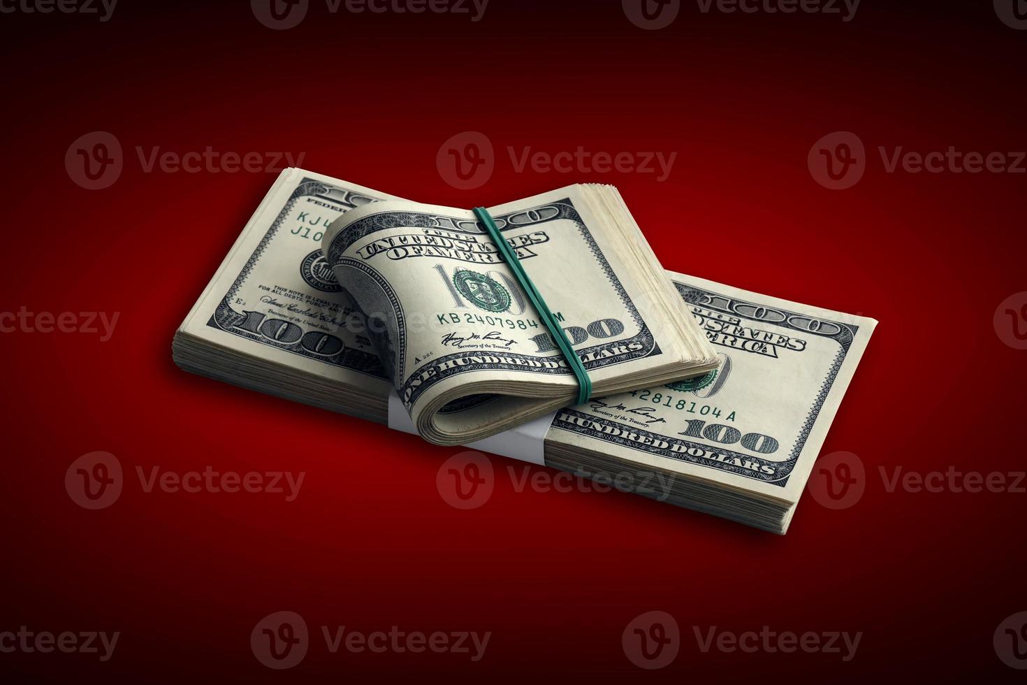 Bundle of US dollar bills isolated on white. Pack of american money with high resolution on perfect white background photo
