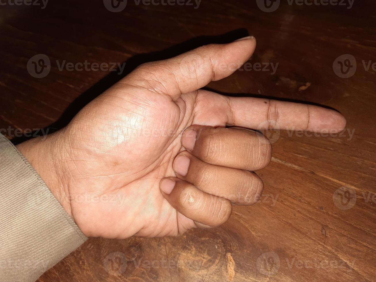 a finger with a pointing shape photo