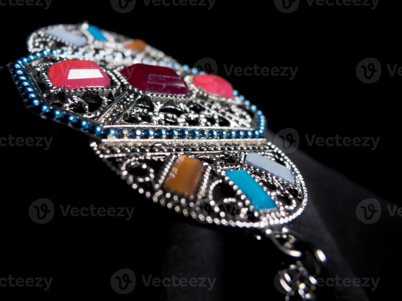 Close up of a colorful necklace with gems photo