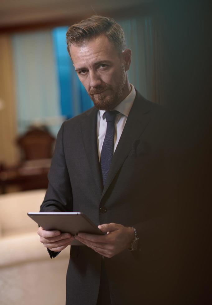 business man using tablet computer photo