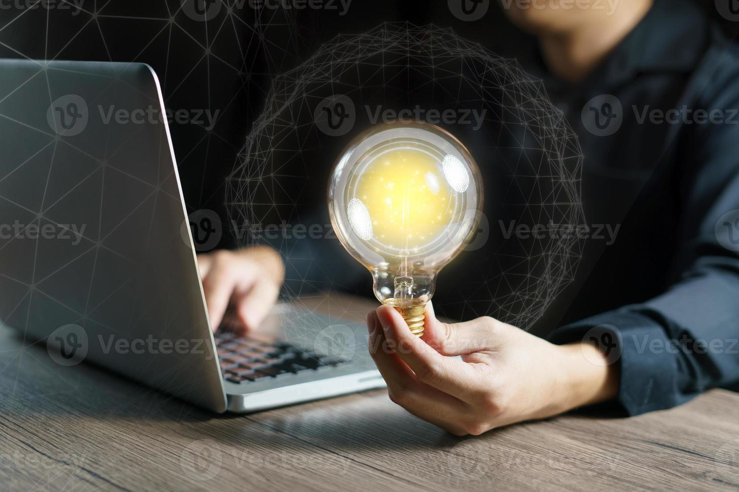 Man hand holding light bulb. idea concept with inspiration. business connection idea. photo
