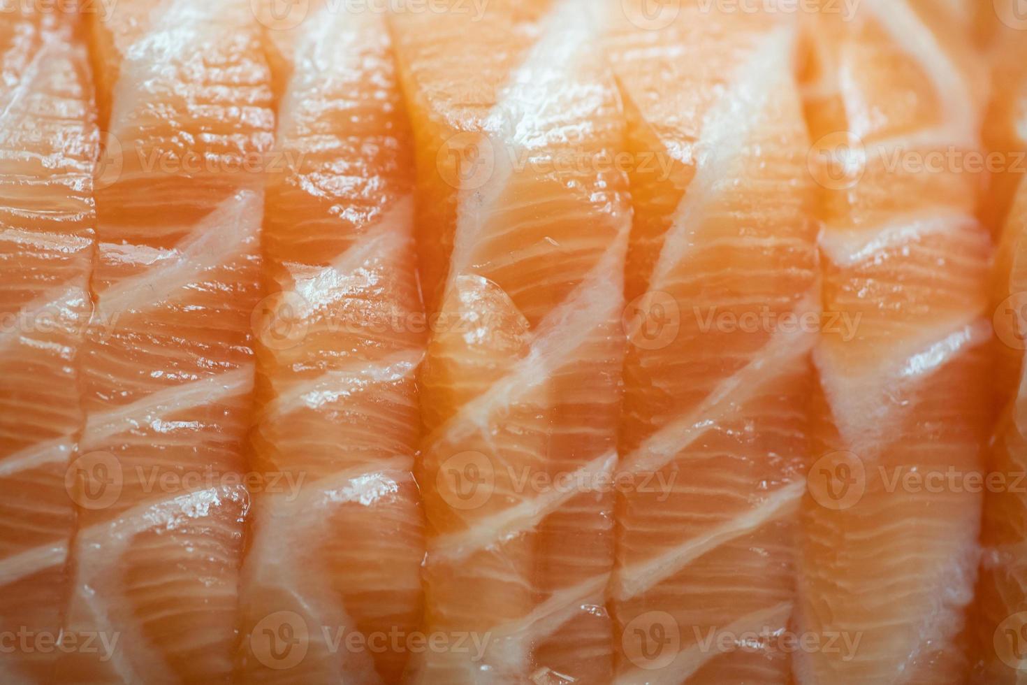 Close up raw fresh Salmon fish meat filleted piece. photo