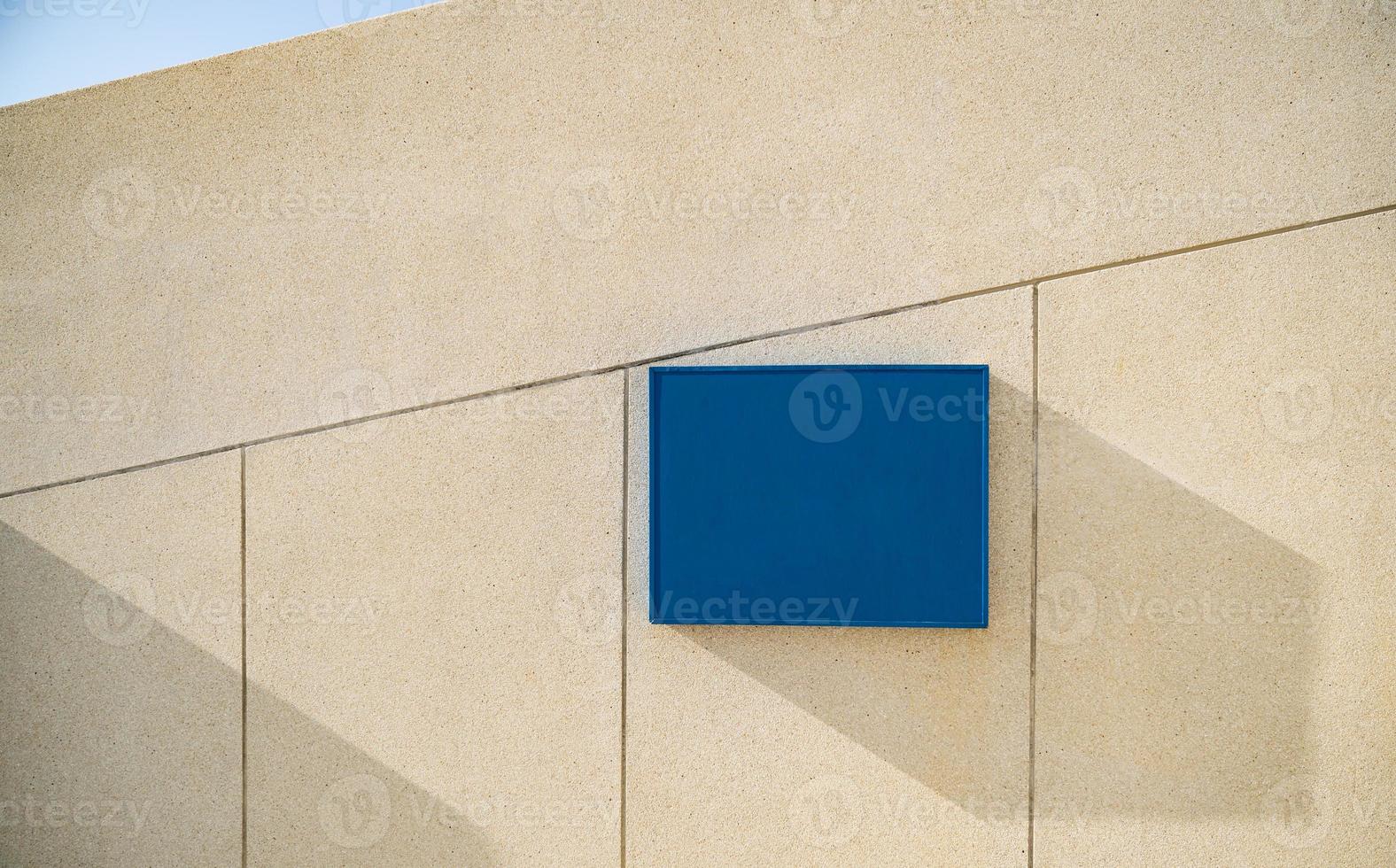 Blank store signage mockup.Shop template hanging mounted on the wall. Signboard for logo. photo