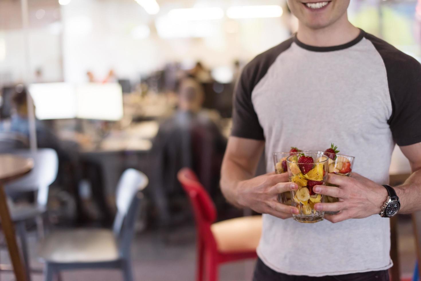 software developer eating a fruit salad photo