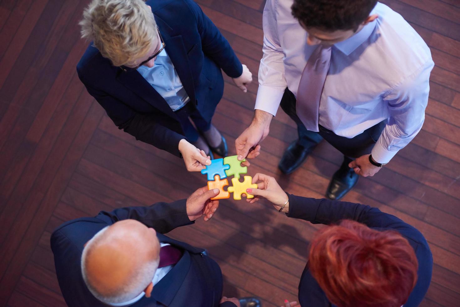 assembling jigsaw puzzle photo