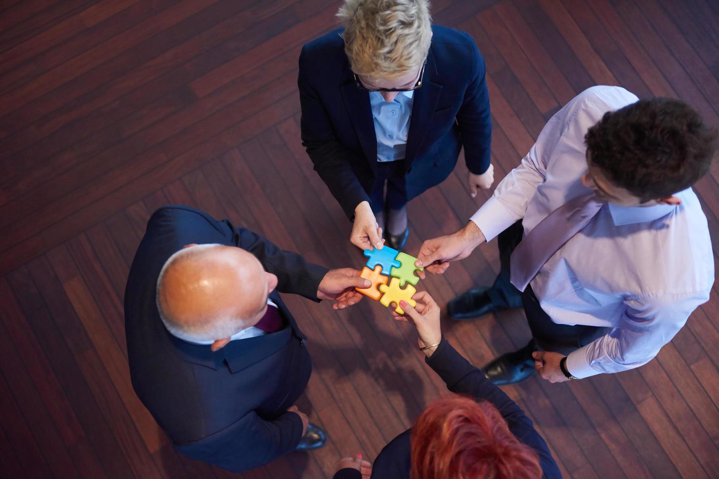 assembling jigsaw puzzle photo