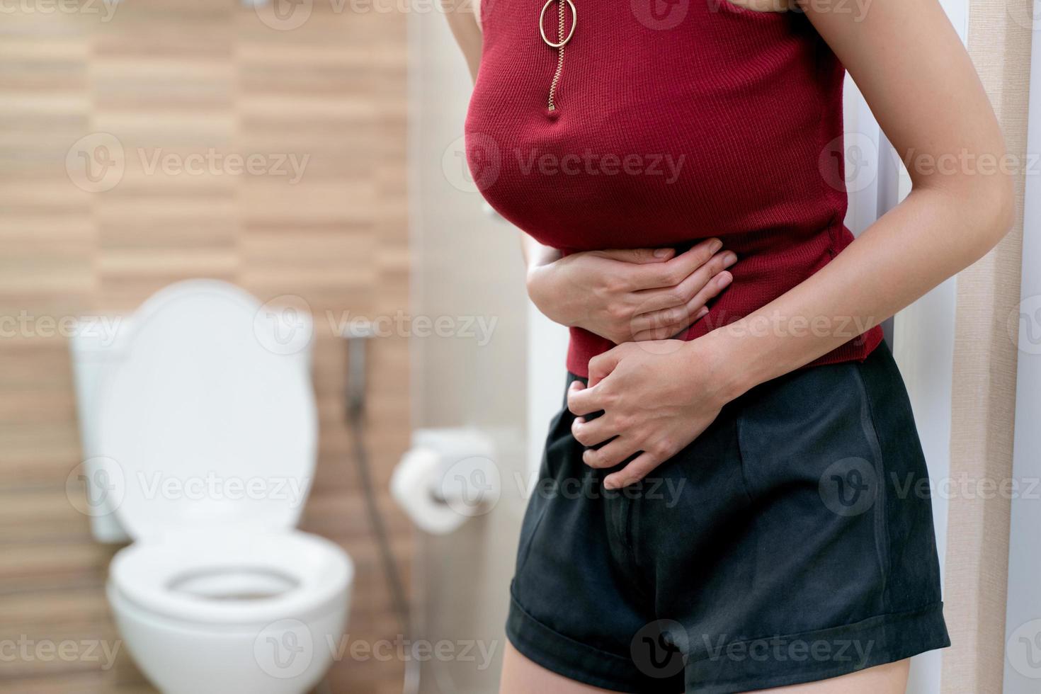 Abdominal pain of woman, stomachache diarrhea symptom, menstrual period cramp or food poisoning. Health care concept. photo