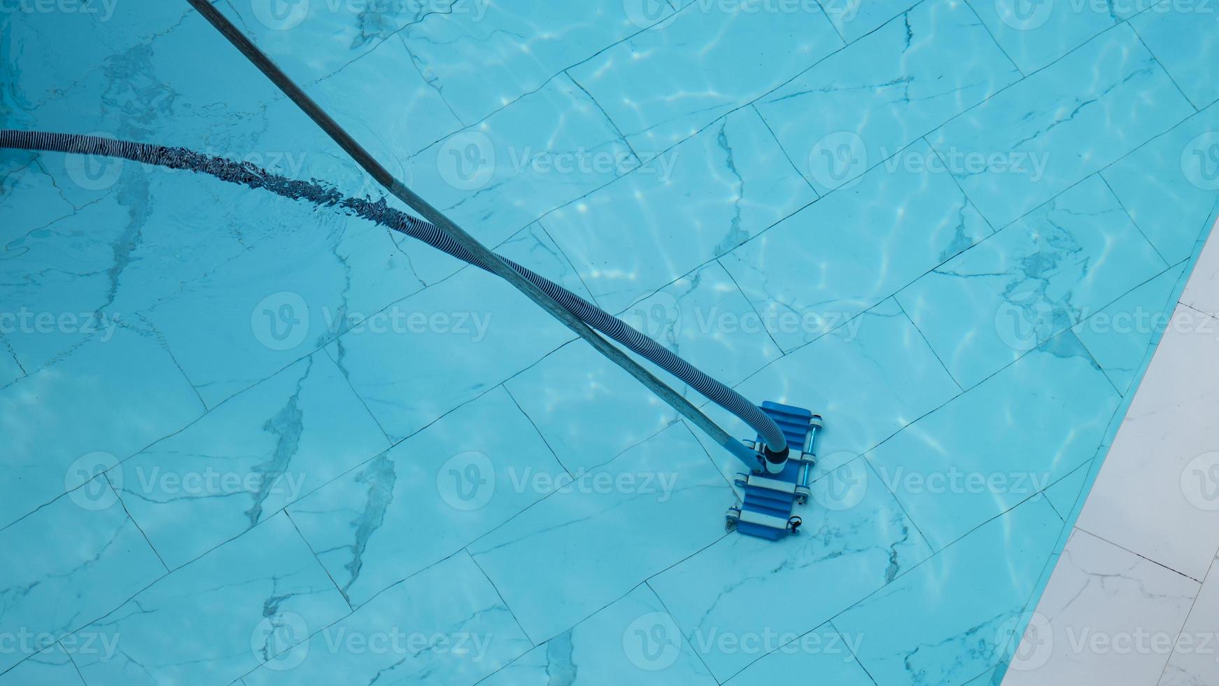 cleaning service and maintenance of the pool. Swimming pool cleaning. photo