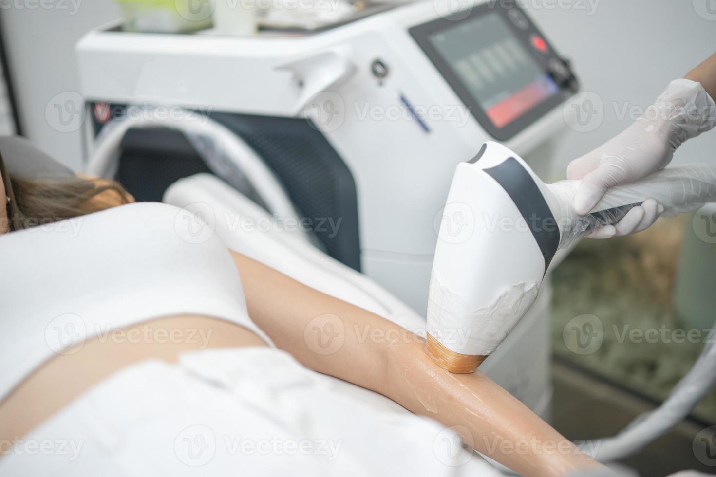 Epilation laser, hair removal or Epilation hair on woman arm. Health and beauty. photo