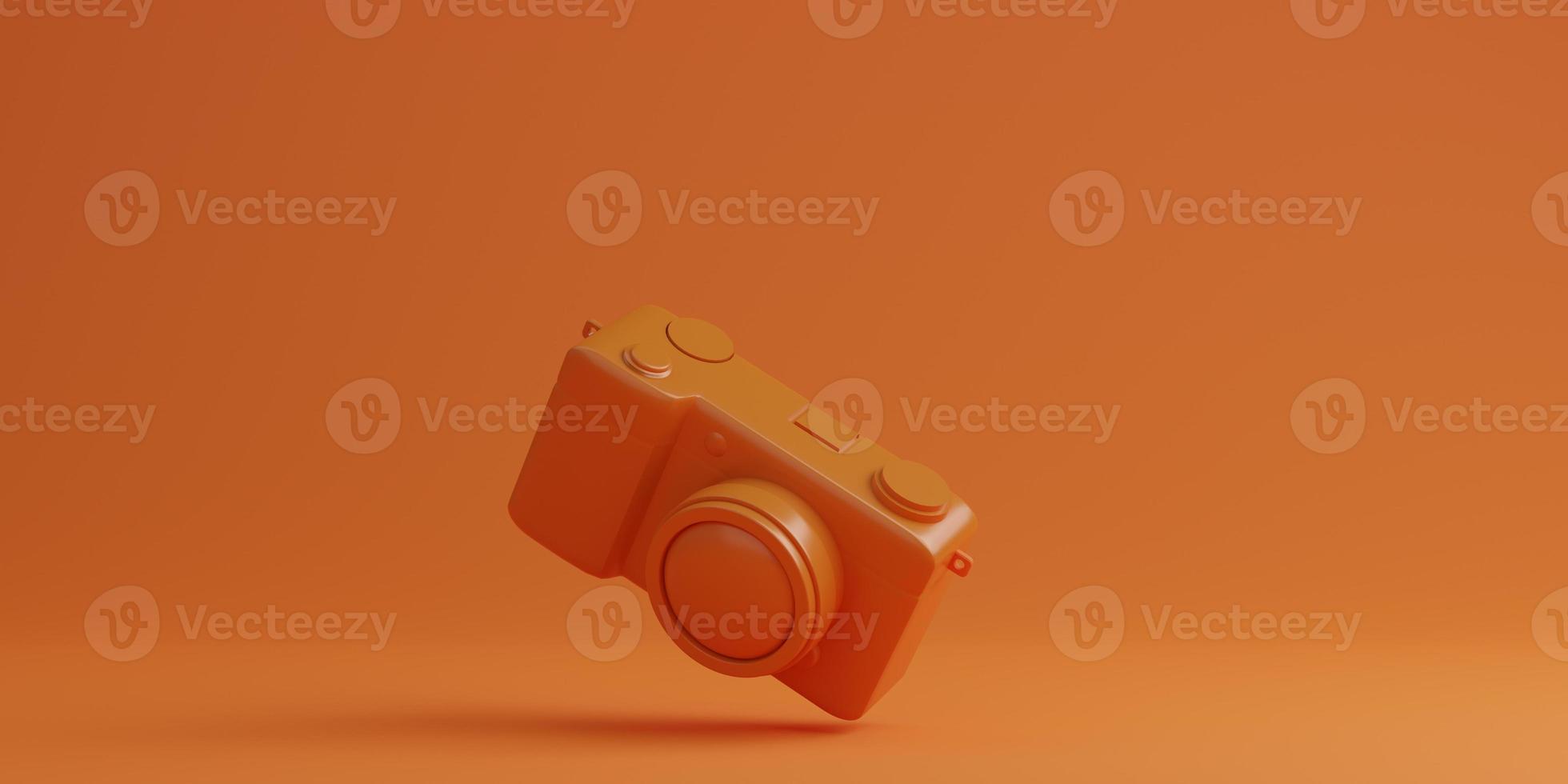 Orange digital camera on orange background, technology concept. 3d rendering photo