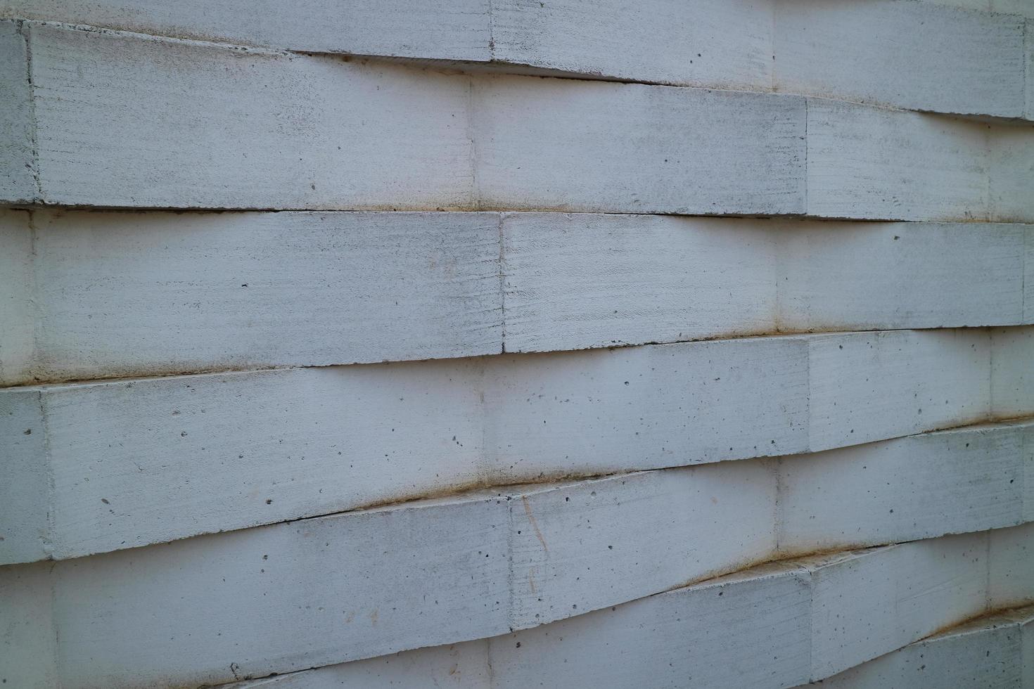 wall of white bricks arranged in a zig zag photo