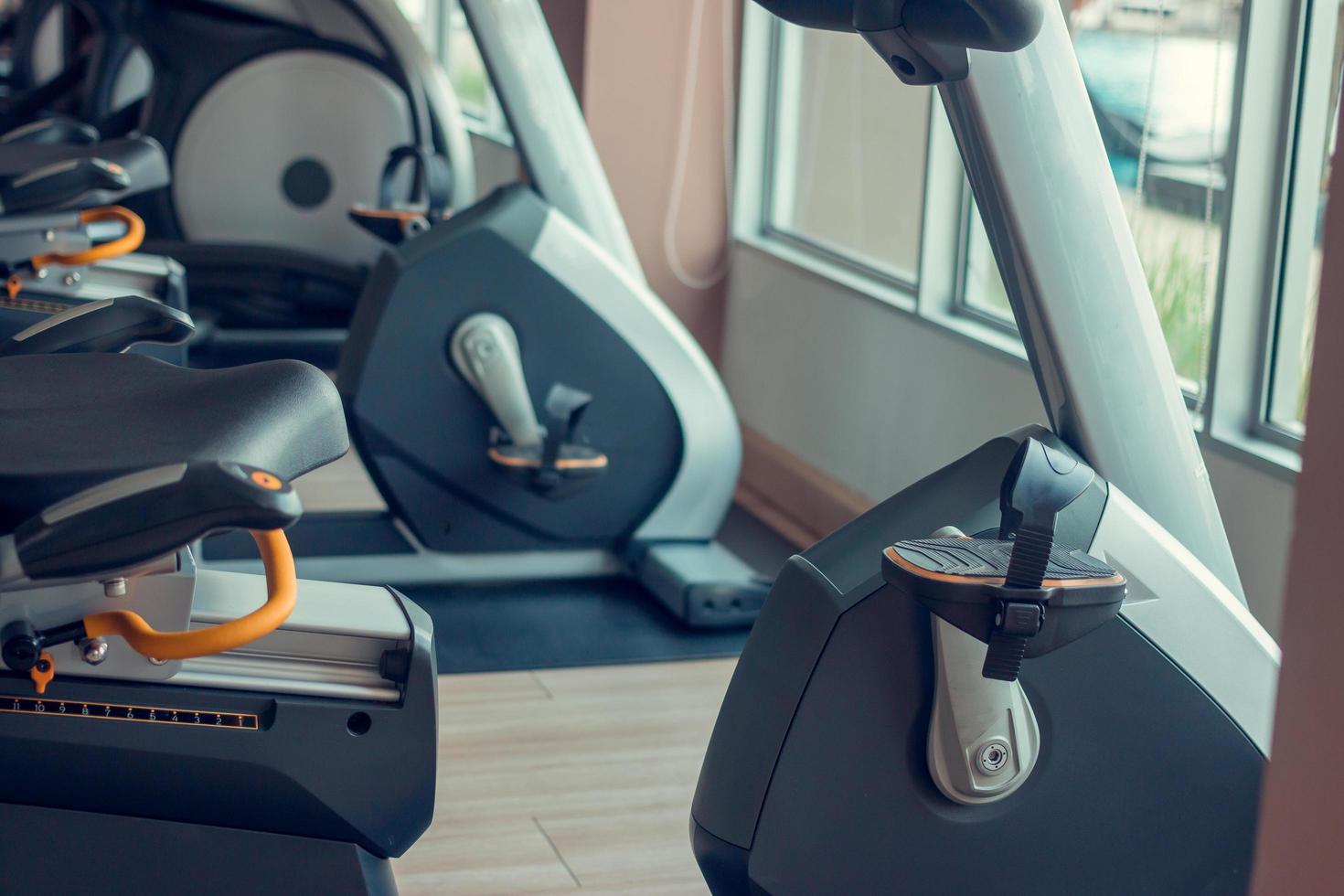 Exercise equipment in an indoor fitness center photo