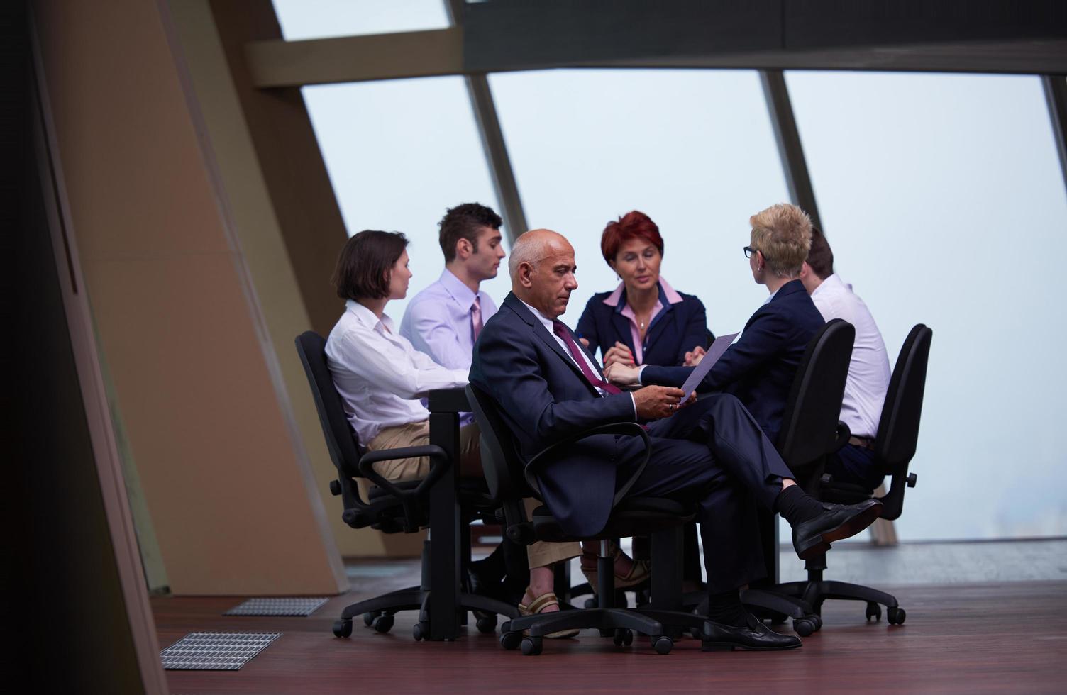business people group on meeting at modern bright office photo