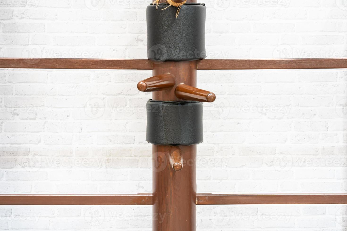 Wing Chun Wooden Dummy. Chinese kung fu practice dummy tool photo