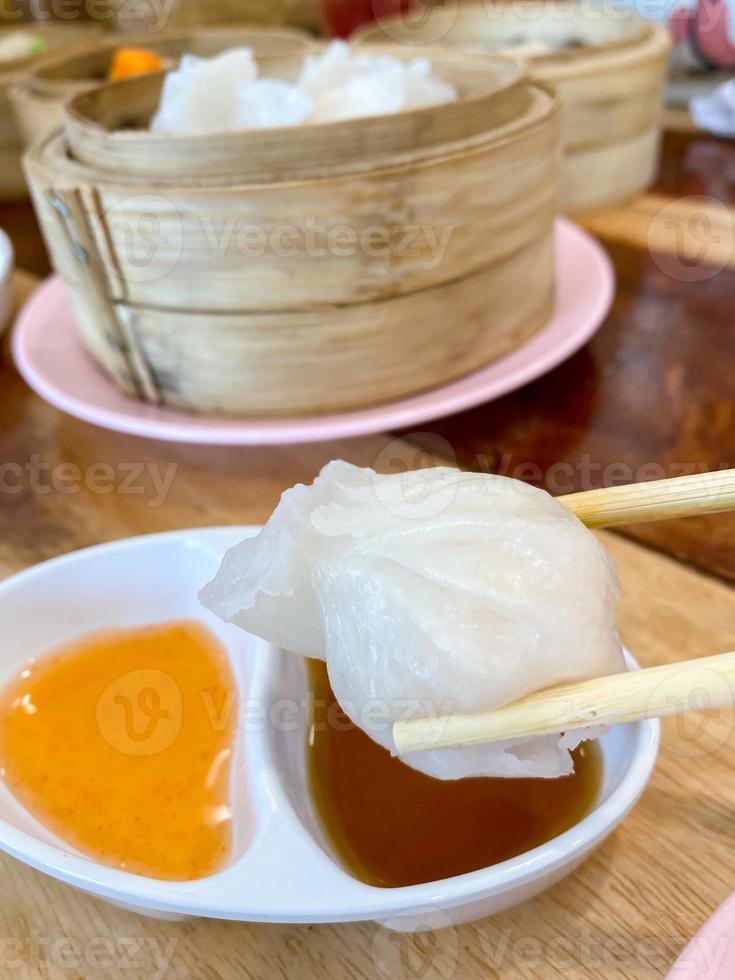 Dim sum top view and text input area, dim sum Chinese food in steamed bamboo is popular all over the world. photo