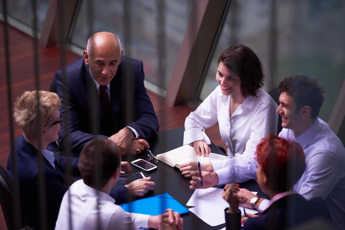 business people group on meeting at modern bright office photo